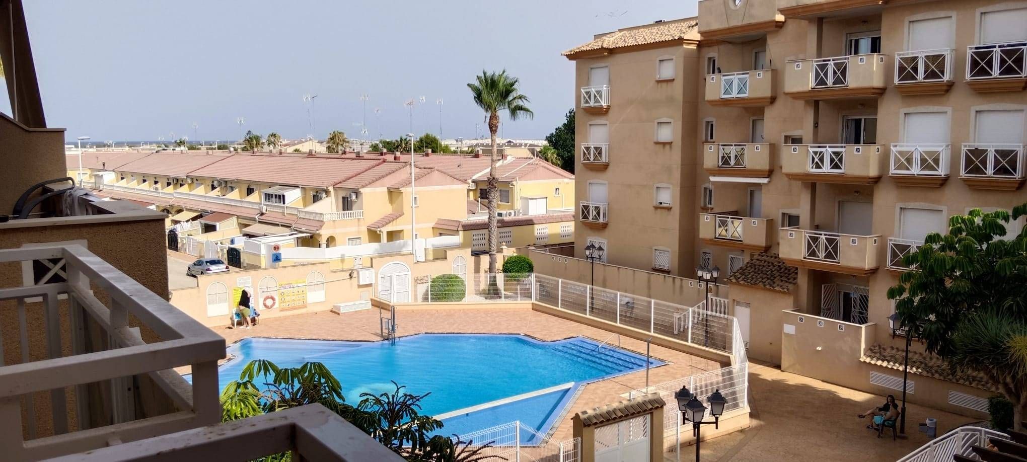 Swimming pool of Flat for sale in San Pedro del Pinatar  with Air Conditioner, Heating and Private garden