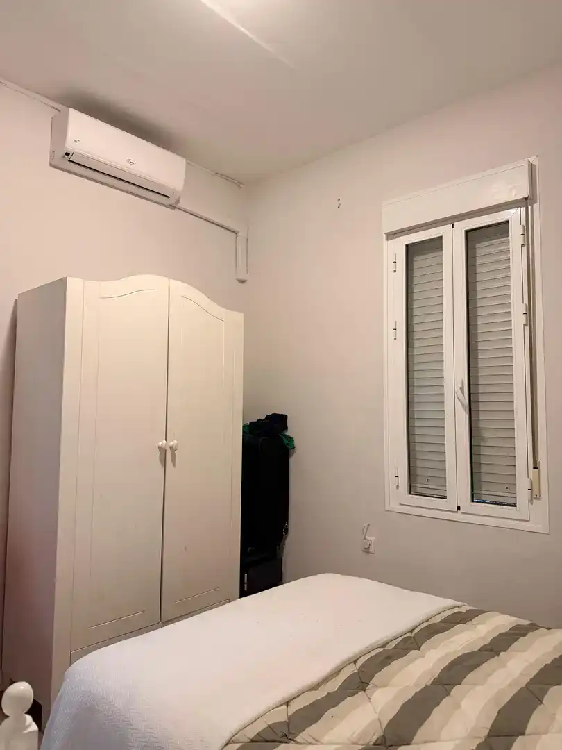 Bedroom of Flat for share in Sevilla  with Air Conditioner, Parquet flooring and Storage room