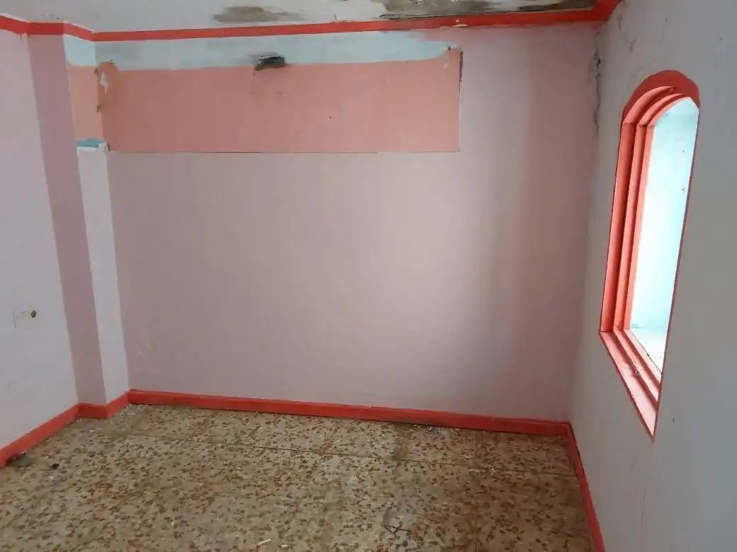 Dormitori de Casa adosada en venda en Guadix