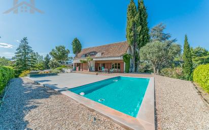 Swimming pool of House or chalet for sale in Tres Cantos  with Air Conditioner, Terrace and Swimming Pool