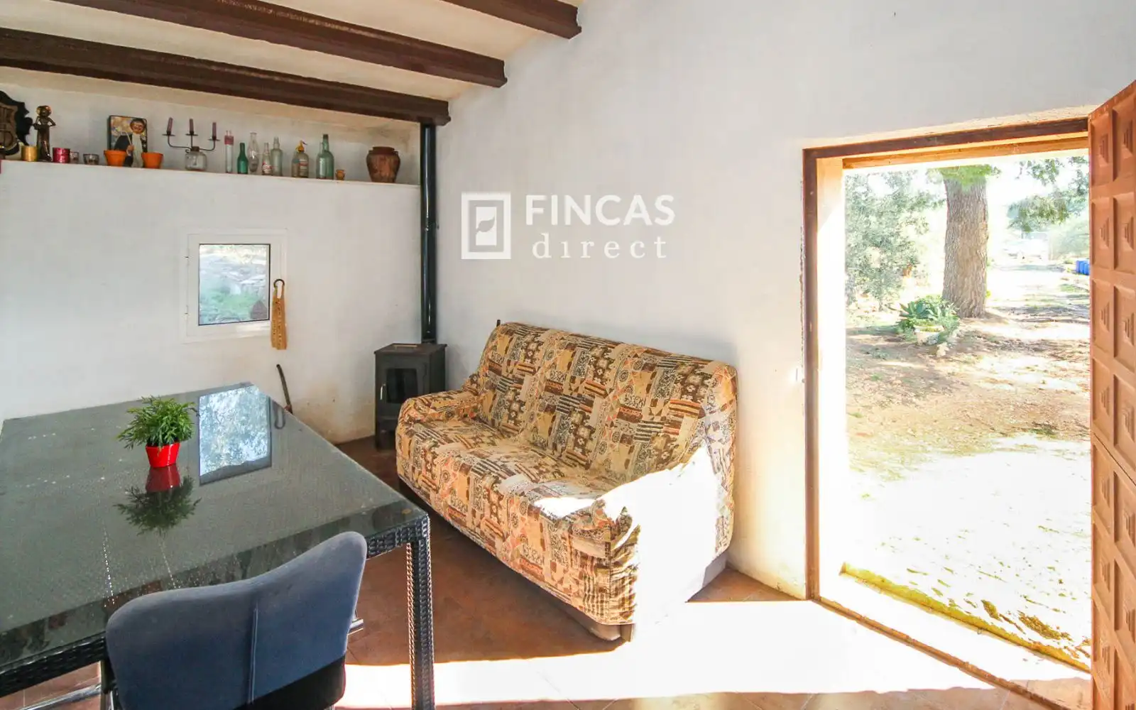 Sala d'estar de Finca rústica en venda en Camarles amb Terrassa i Moblat