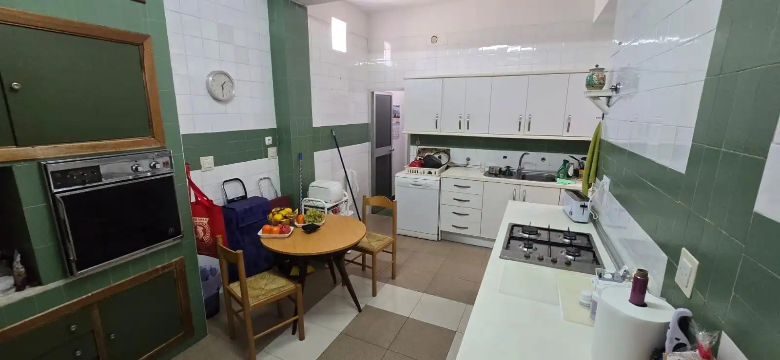 Kitchen of Flat for sale in Sevilla  with Air Conditioner, Terrace and Storage room