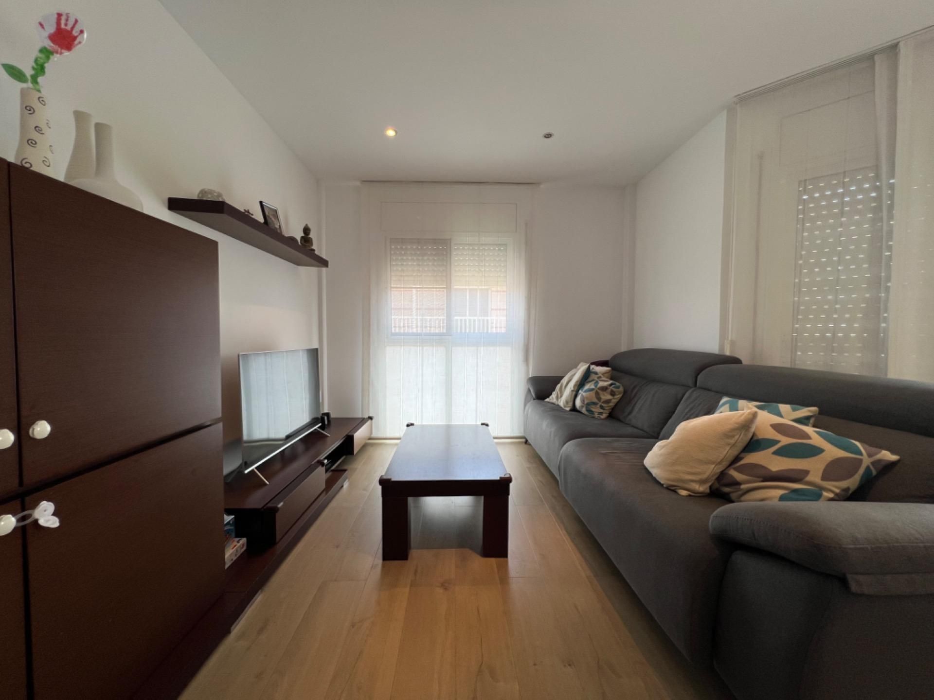Living room of Single-family semi-detached for sale in Camarles  with Air Conditioner, Heating and Parquet flooring