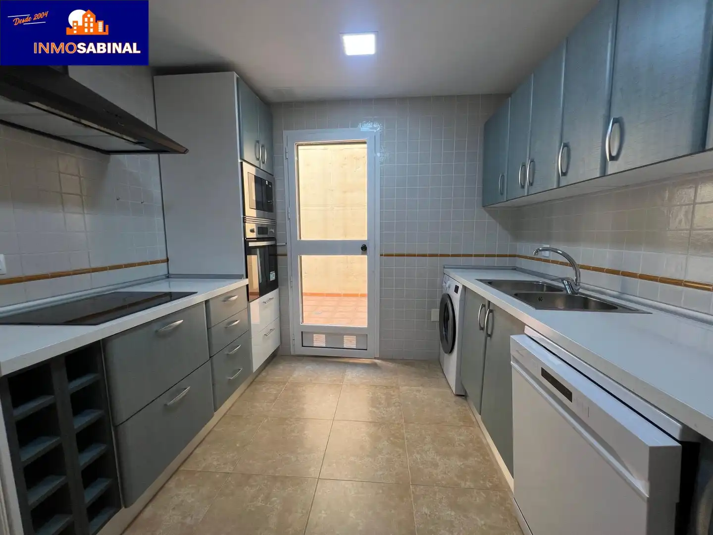 Cocina de Casa adosada de alquiler en Roquetas de Mar con Aire acondicionado, Terraza y Piscina comunitaria
