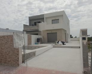 Vista exterior de Casa adosada en venda en Daya Nueva amb Jardí privat, Terrassa i Traster