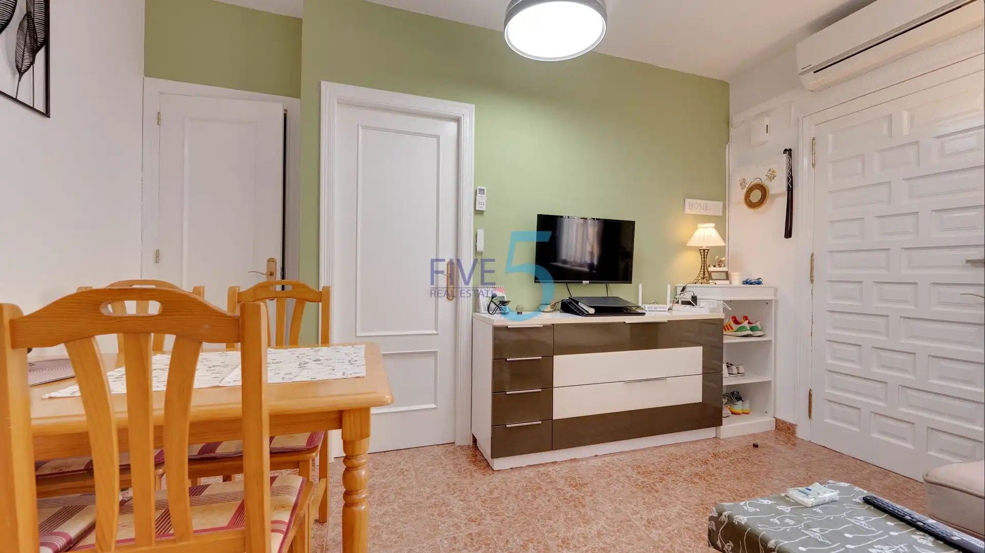 Sala de estar de Casa adosada en venta en Torrevieja con Aire acondicionado, Terraza y Piscina