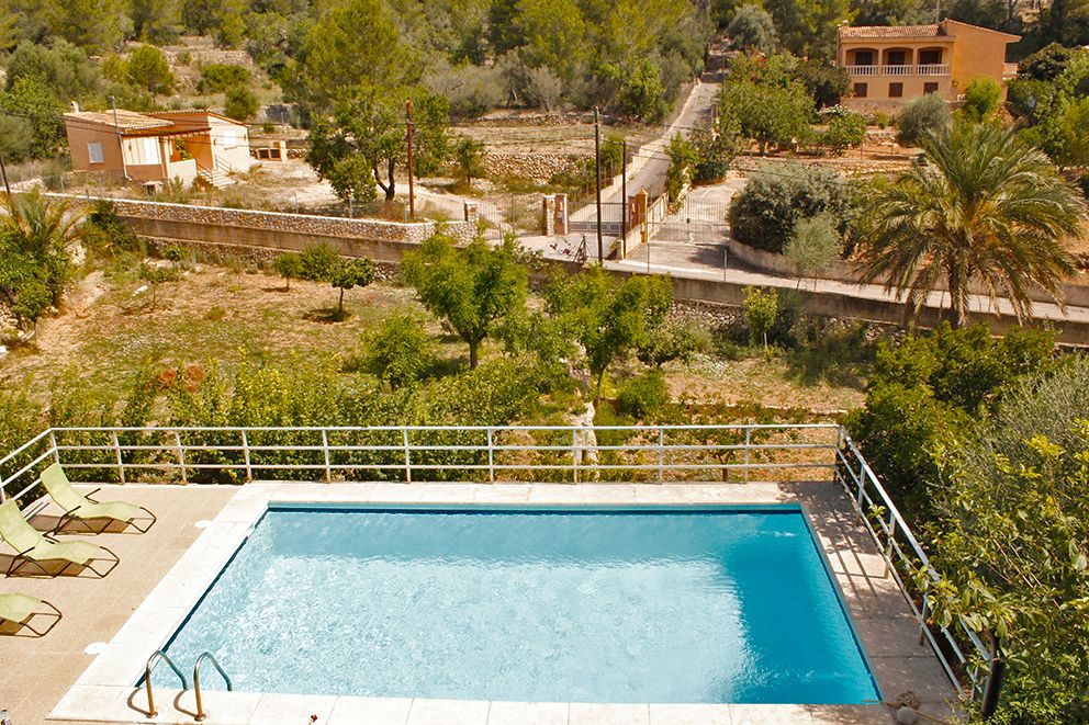 Swimming pool of Country house for sale in Andratx  with Air Conditioner, Heating and Private garden