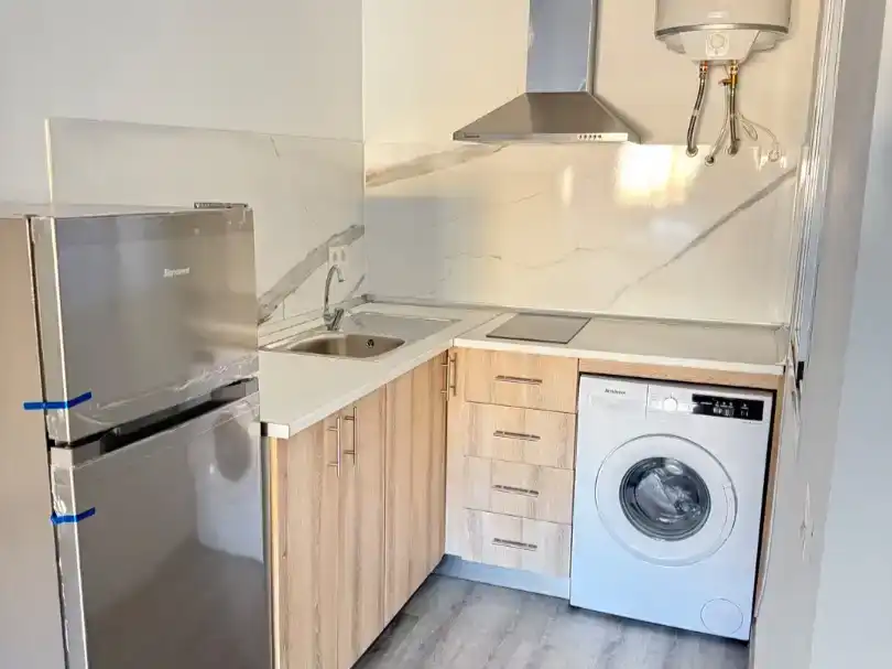 Cuina de Pis de lloguer en Coín amb Aire condicionat i Moblat