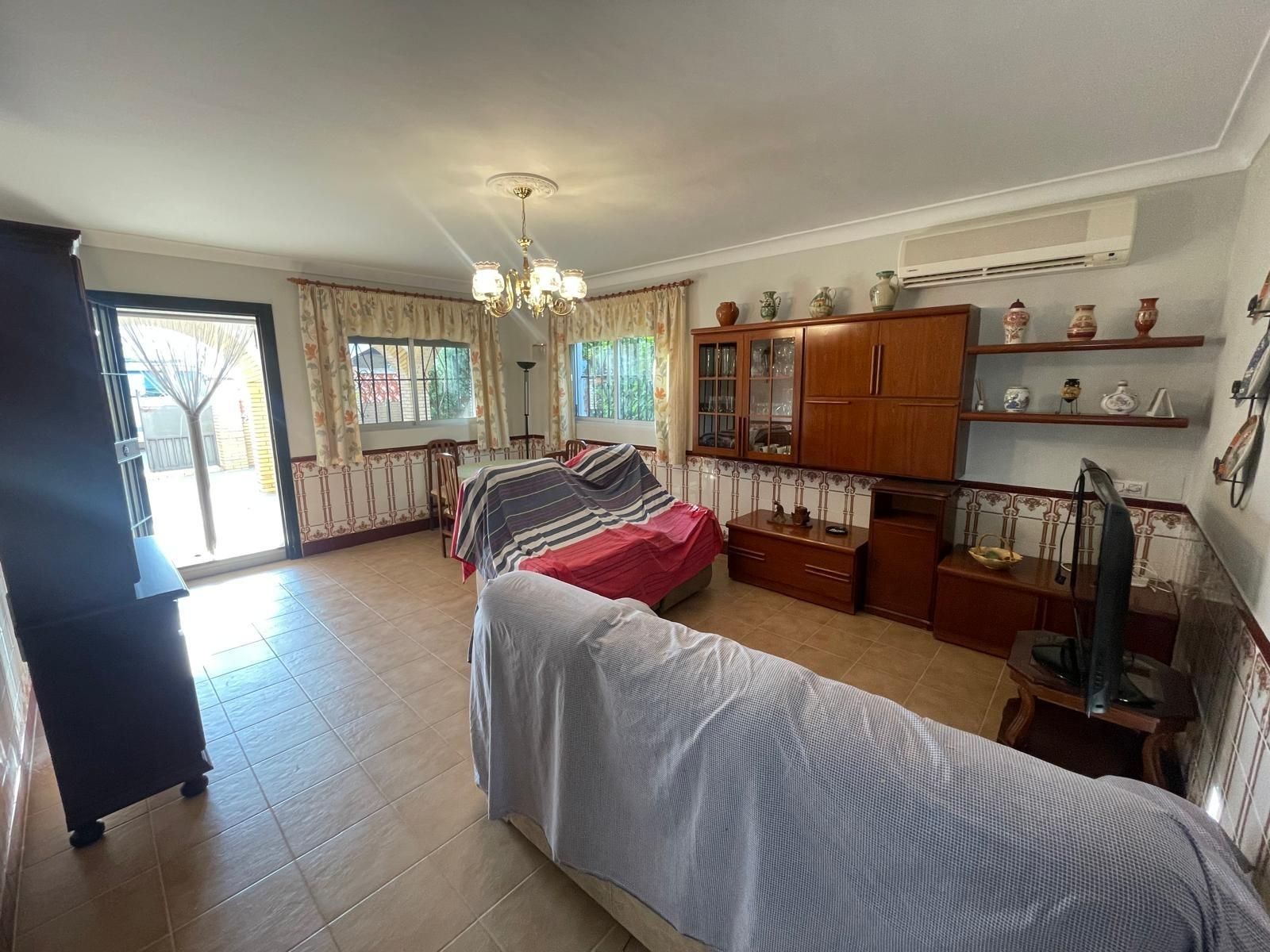Sala d'estar de Casa adosada en venda en Fuentes de Andalucía