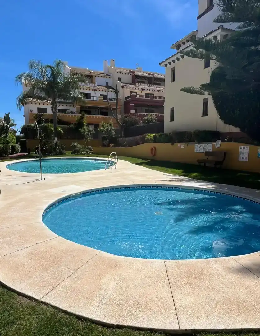 Piscina de Pis de lloguer en Ayamonte amb Aire condicionat, Jardí privat i Parquet