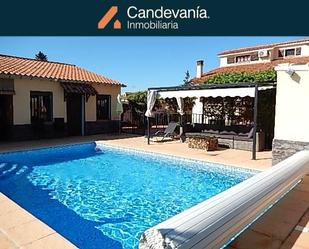 Vista exterior de Casa o xalet en venda en San Mateo de Gállego amb Aire condicionat, Calefacció i Jardí privat