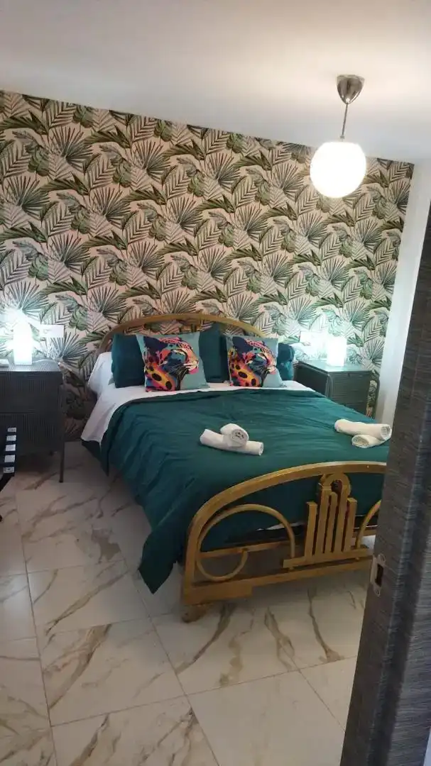 Dormitori de Casa adosada de lloguer en Martos amb Aire condicionat, Moblat i Rentadora