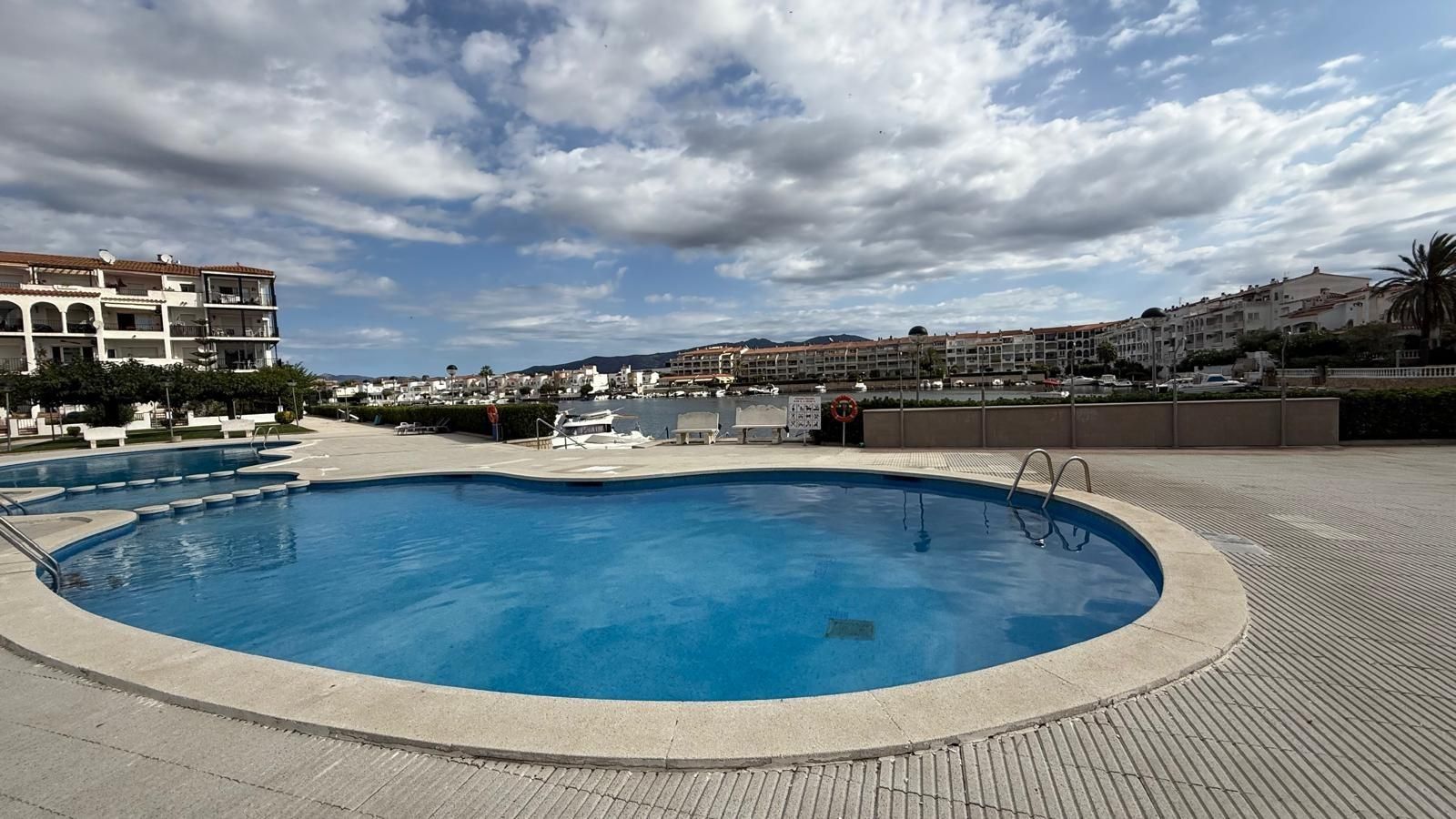 Swimming pool of Apartment for sale in Empuriabrava  with Air Conditioner, Private garden and Terrace