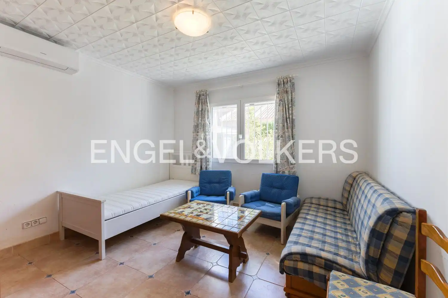 Sala d'estar de Casa o xalet en venda en Sagunto / Sagunt amb Aire condicionat, Calefacció i Jardí privat