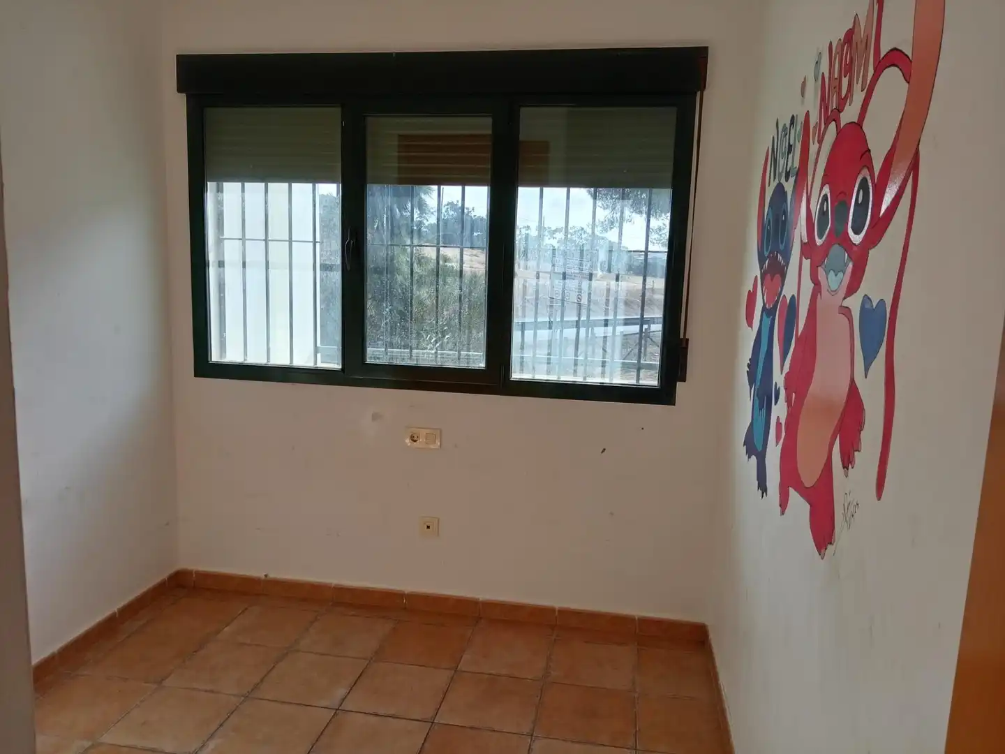 Habitación de Casa adosada en venta en Isla Cristina con Jardín privado