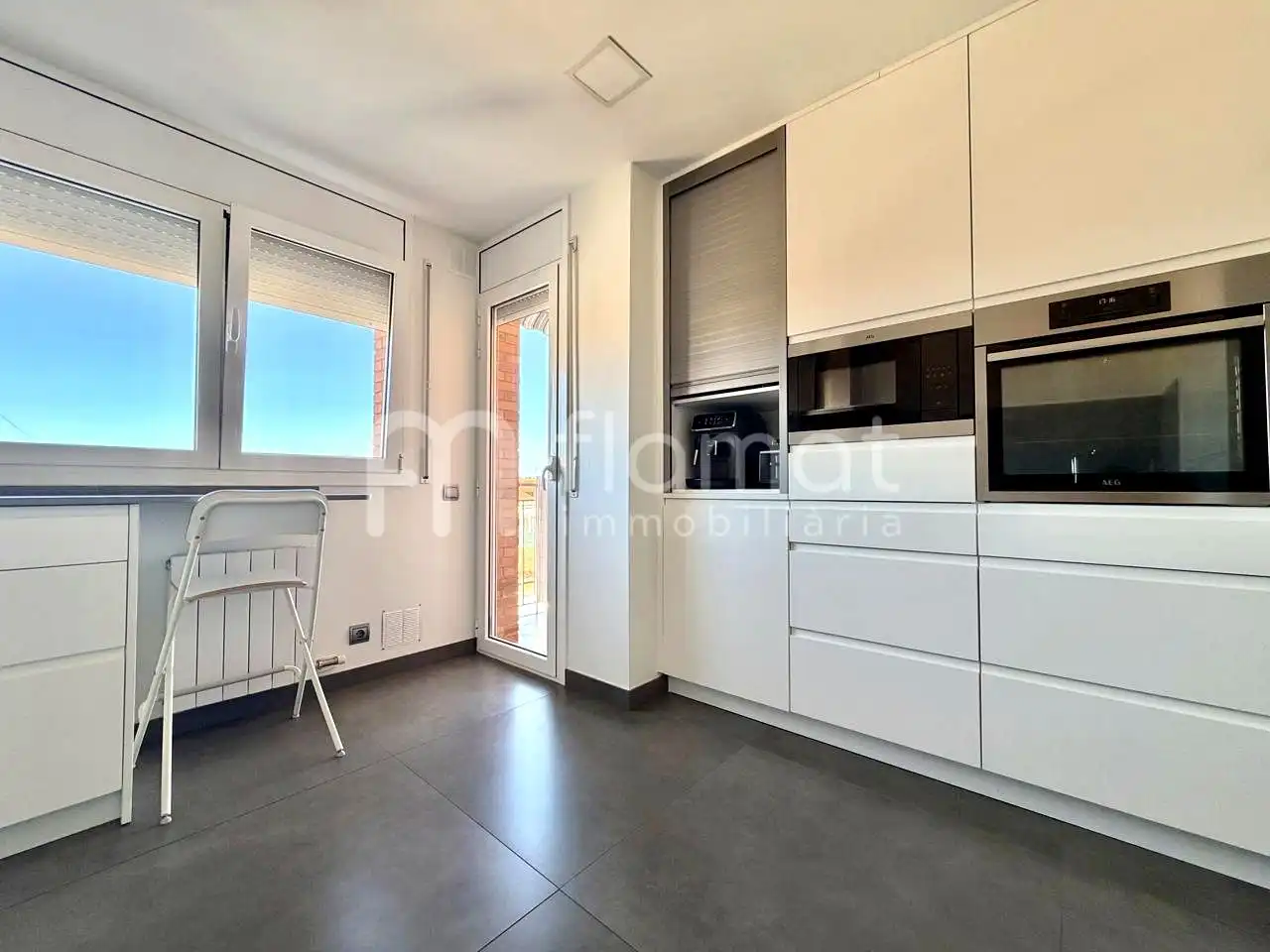 Küche von Dachboden zum Verkauf in Malgrat de Mar mit Klimaanlage und Terrasse