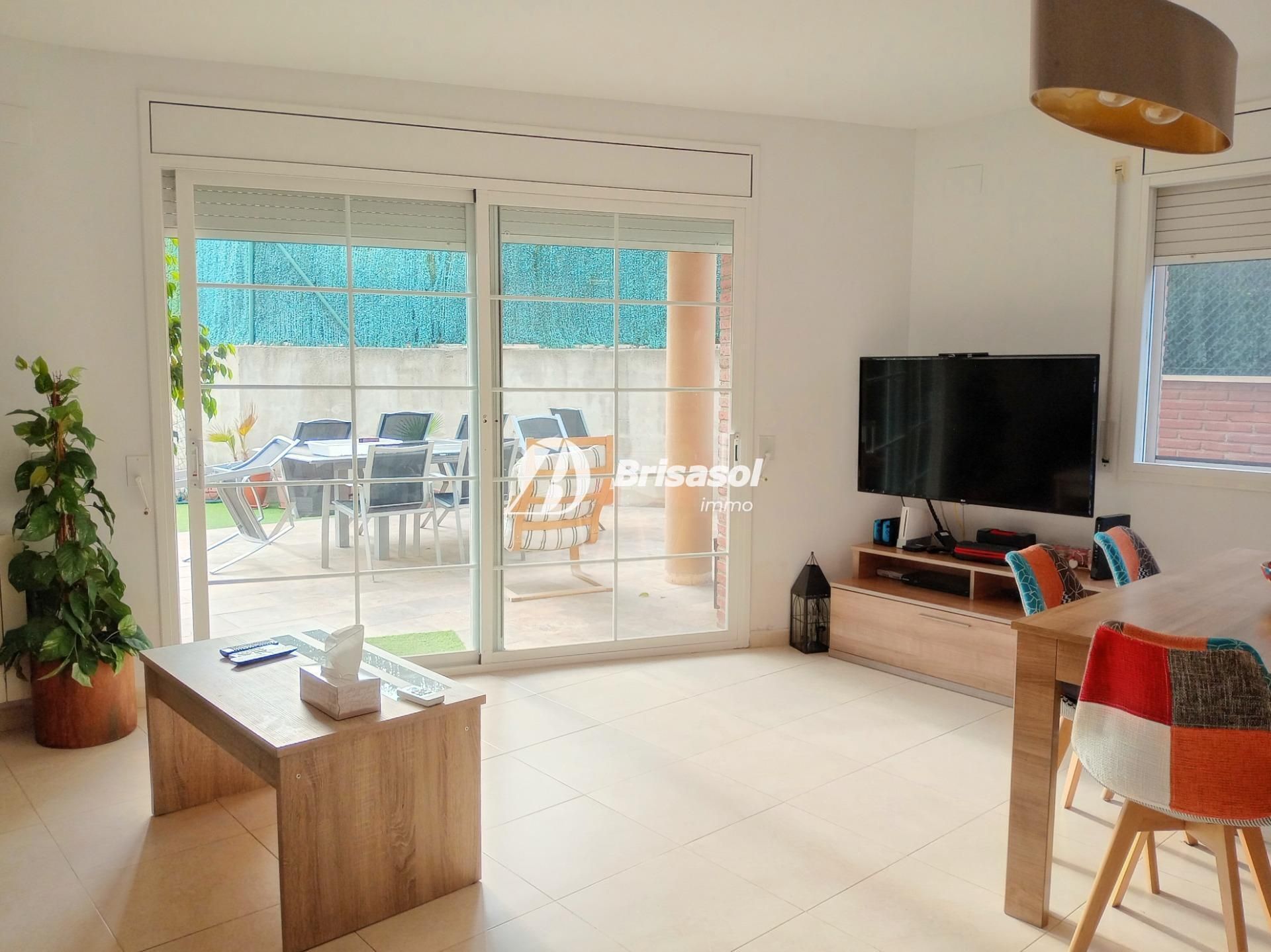 Sala de estar de Casa adosada en venta en Cambrils con Aire acondicionado, Jardín privado y Terraza