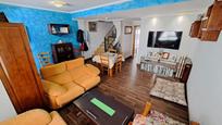 Sala d'estar de Casa adosada en venda en Alzira amb Aire condicionat i Terrassa