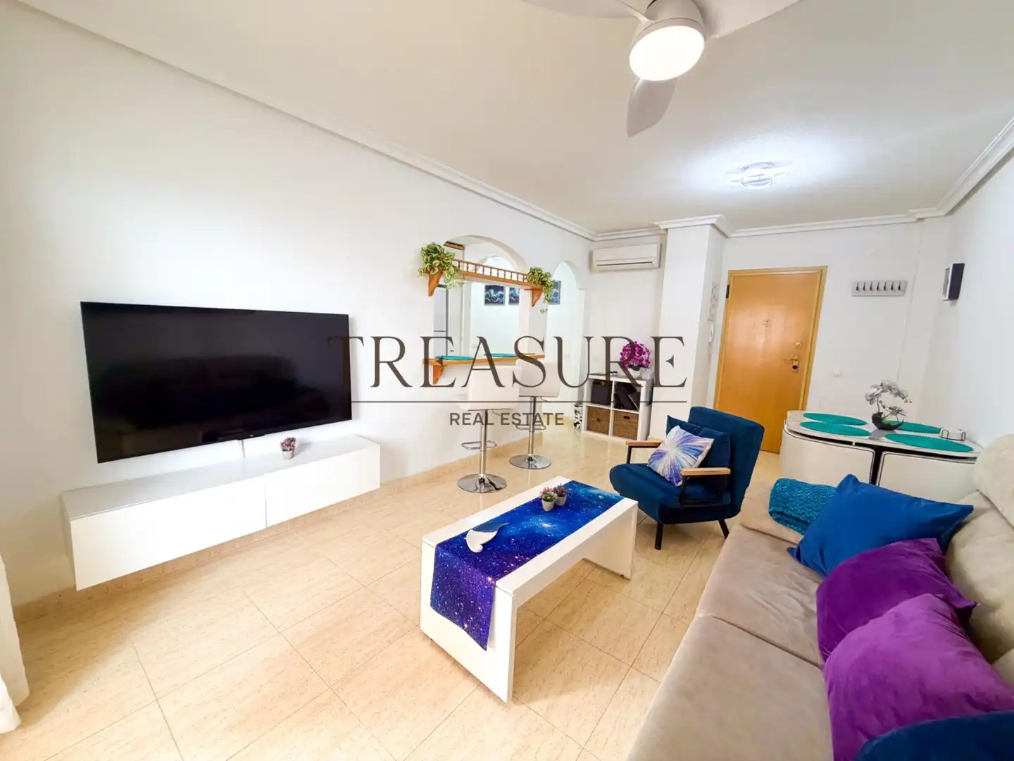 Sala d'estar de Apartament en venda en La Manga del Mar Menor amb Aire condicionat, Terrassa i Moblat
