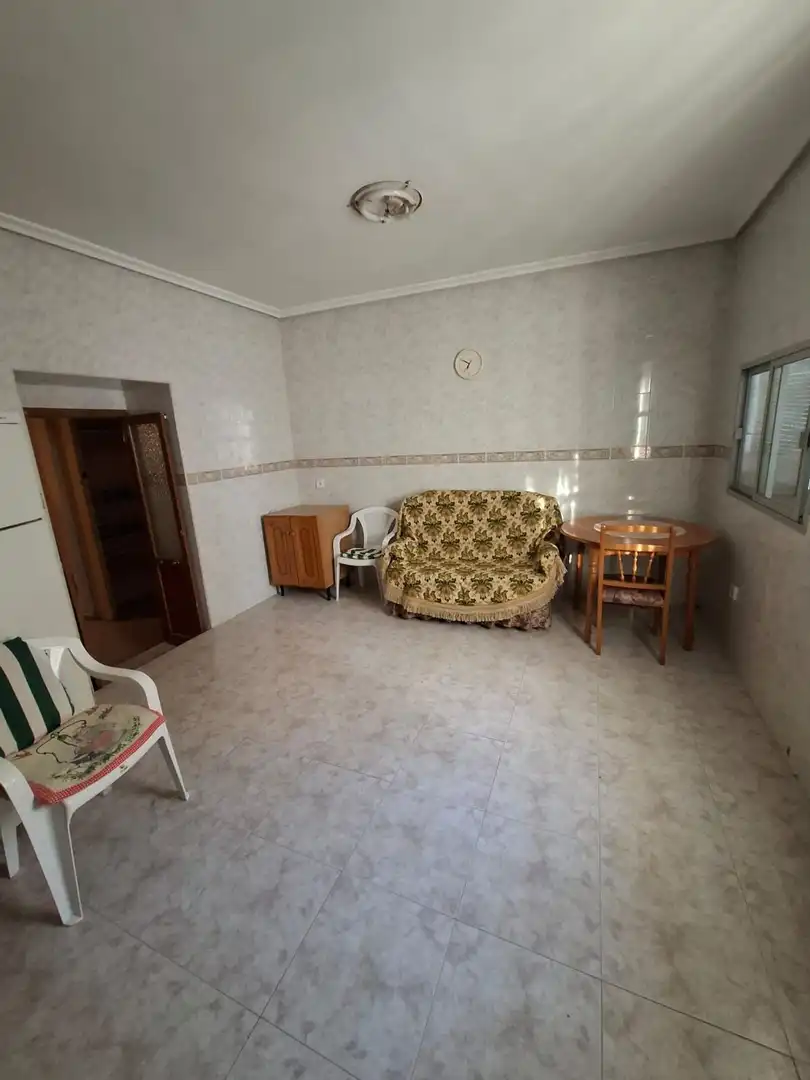 Sala d'estar de Casa adosada en venda en Jabalquinto amb Traster, Piscina i Domòtica
