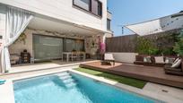 Swimming pool of Single-family semi-detached for sale in  Madrid Capital  with Heating, Private garden and Terrace
