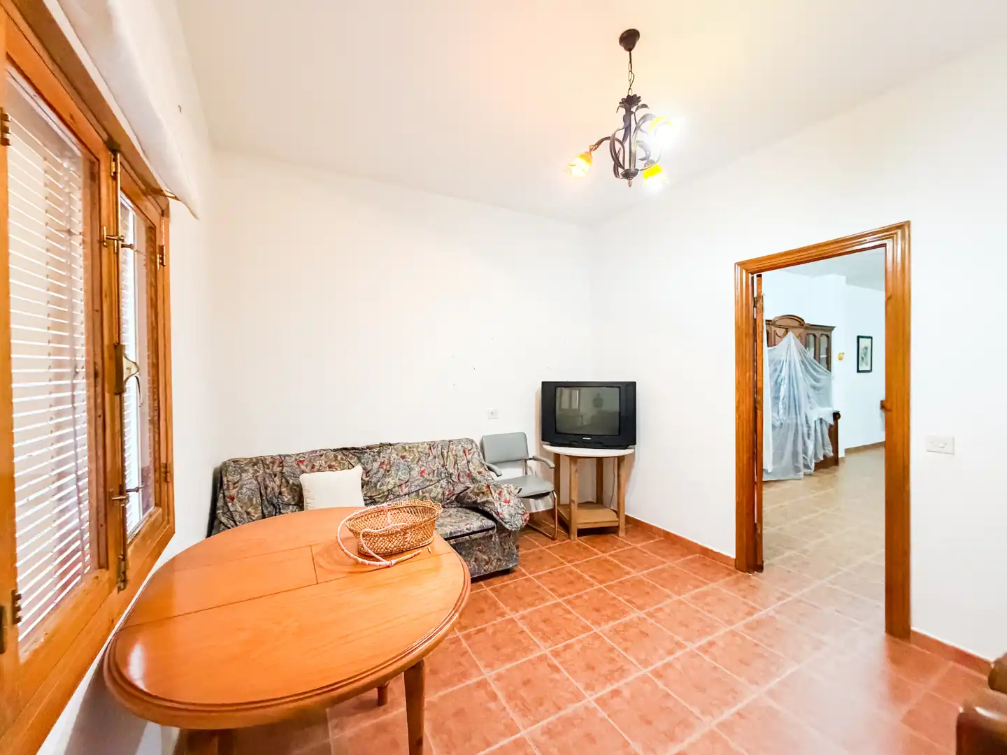 Sala de estar de Casa adosada en venta en Zújar con Calefacción, Terraza y Amueblado