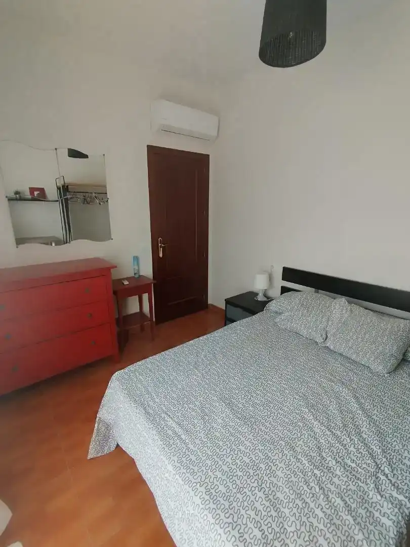 Dormitori de Casa adosada per a compartir en Córdoba amb Aire condicionat, Moblat i Forn