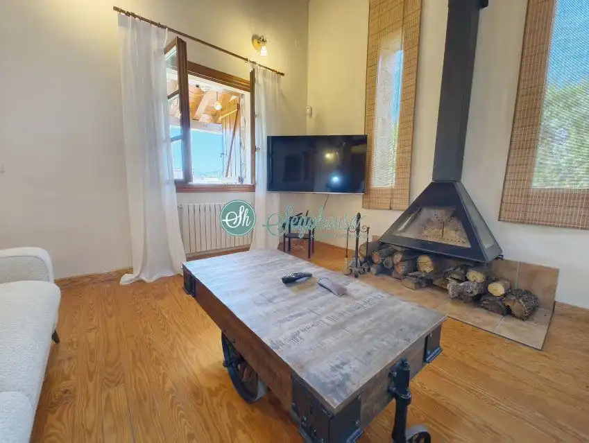 Sala de estar de Casa o chalet en venta en Palazuelos de Eresma con Calefacción, Terraza y Amueblado