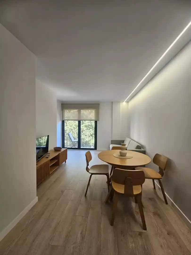 Living room of Flat for rent in Figueres  with Air Conditioner, Heating and Parquet flooring