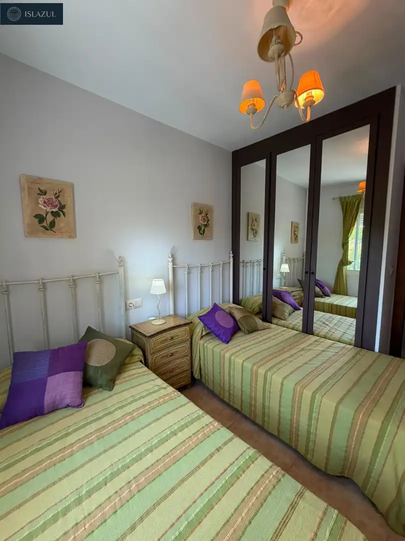 Schlafzimmer von Einfamilien-Reihenhaus zum Verkauf in Islantilla mit Privatgarten, Terrasse und Abstellraum