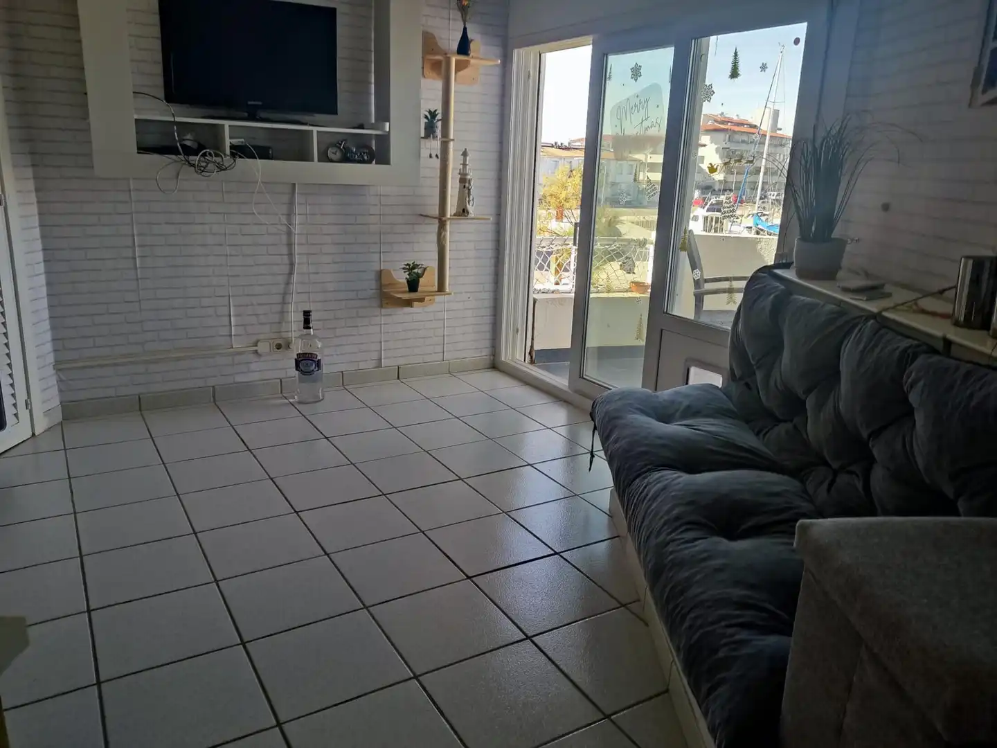 Sala de estar de Piso en venta en Roses con Jardín privado, Terraza y Amueblado