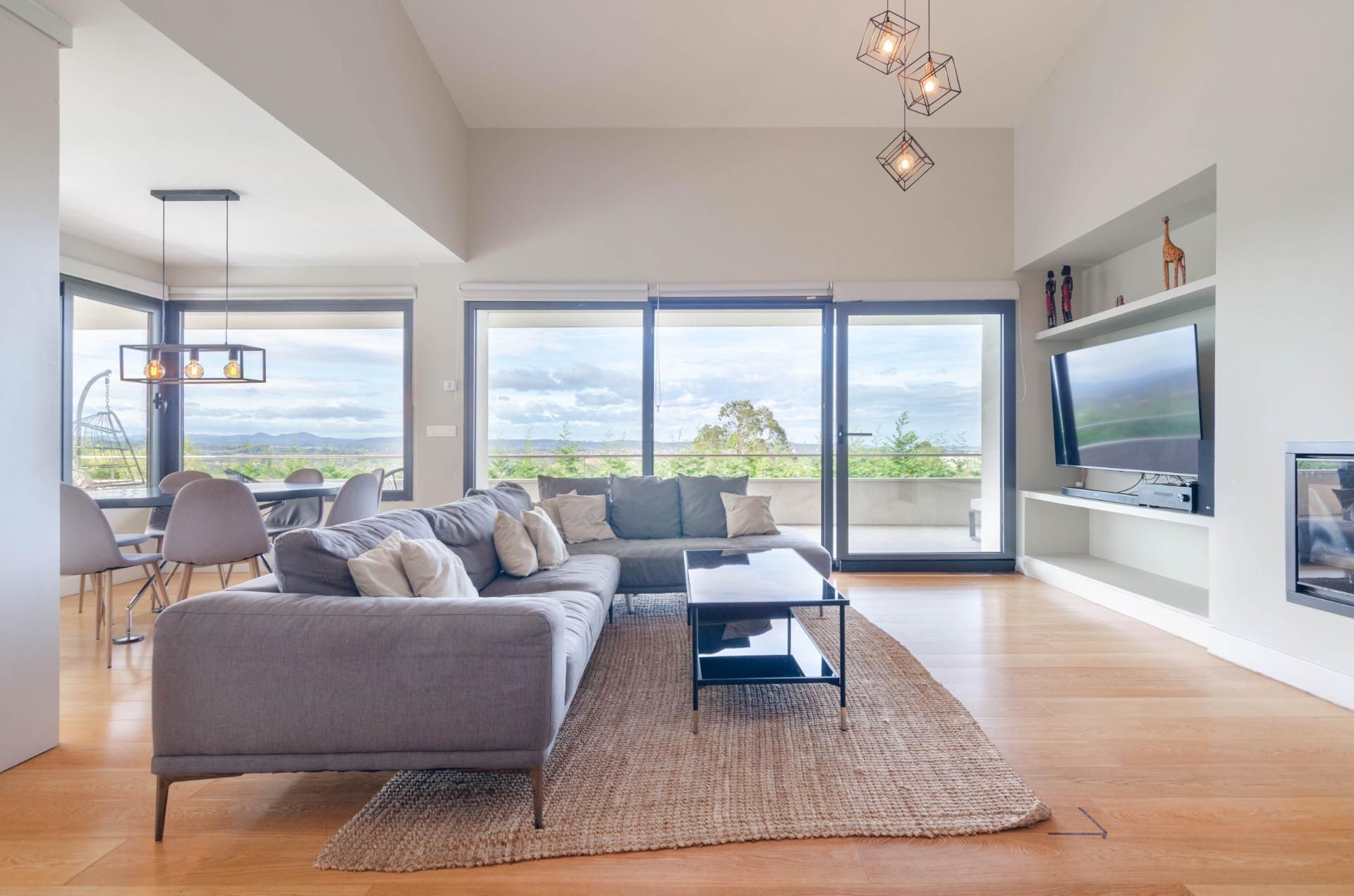 Living room of House or chalet for sale in Gijón   with Heating, Private garden and Parquet flooring