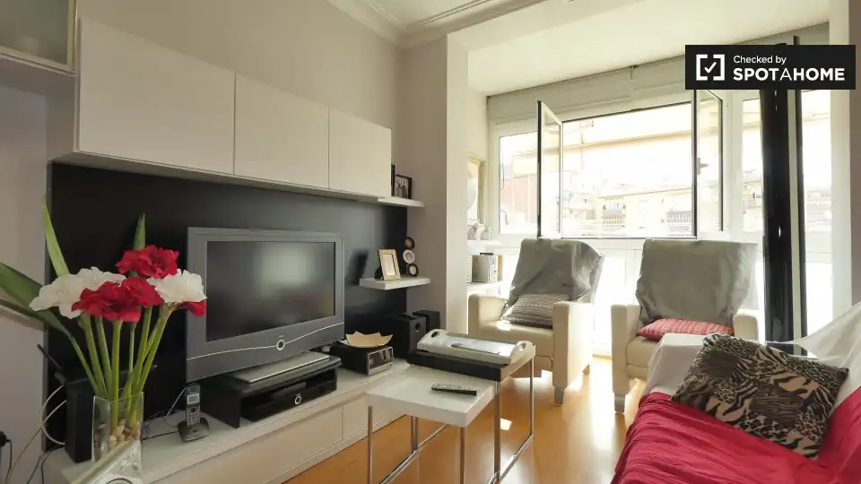 Sala de estar de Piso para compartir en Barcelona con Aire acondicionado, Calefacción y Amueblado