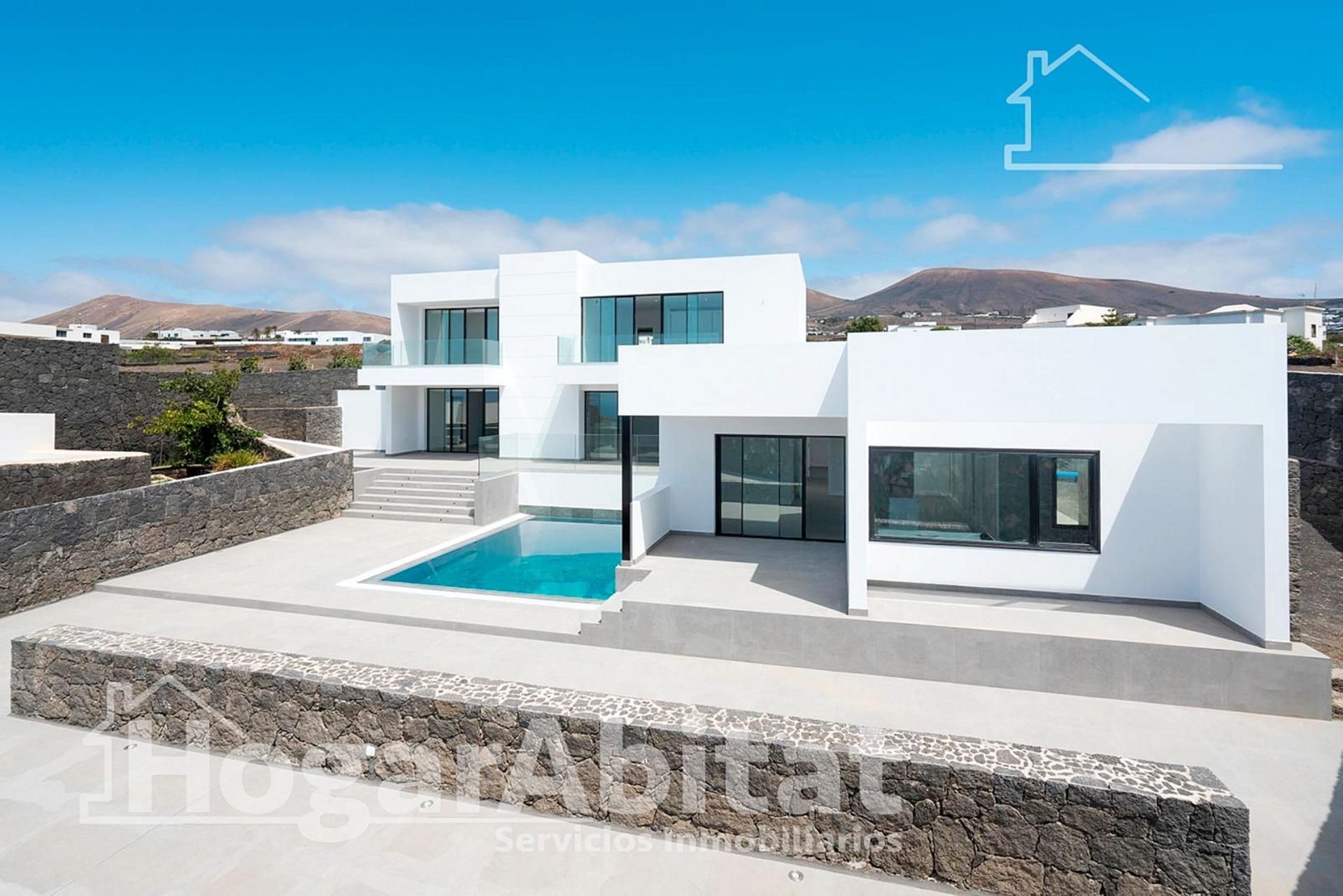 Vista exterior de Casa o xalet en venda en Tías amb Aire condicionat, Calefacció i Jardí privat