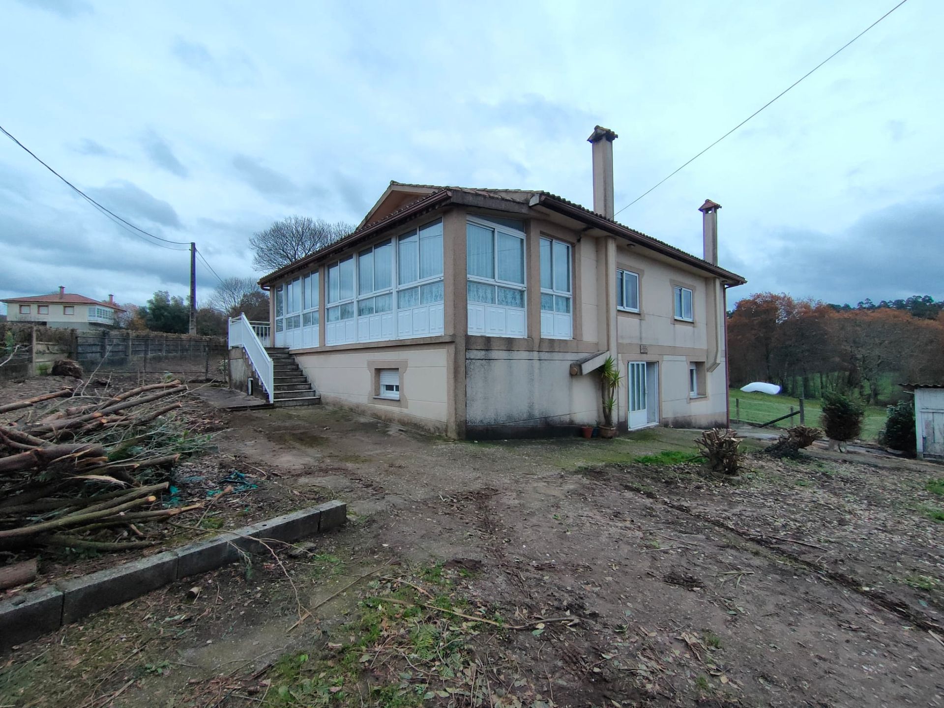 Vista exterior de Casa o xalet en venda en O Pino  amb Calefacció, Jardí privat i Moblat
