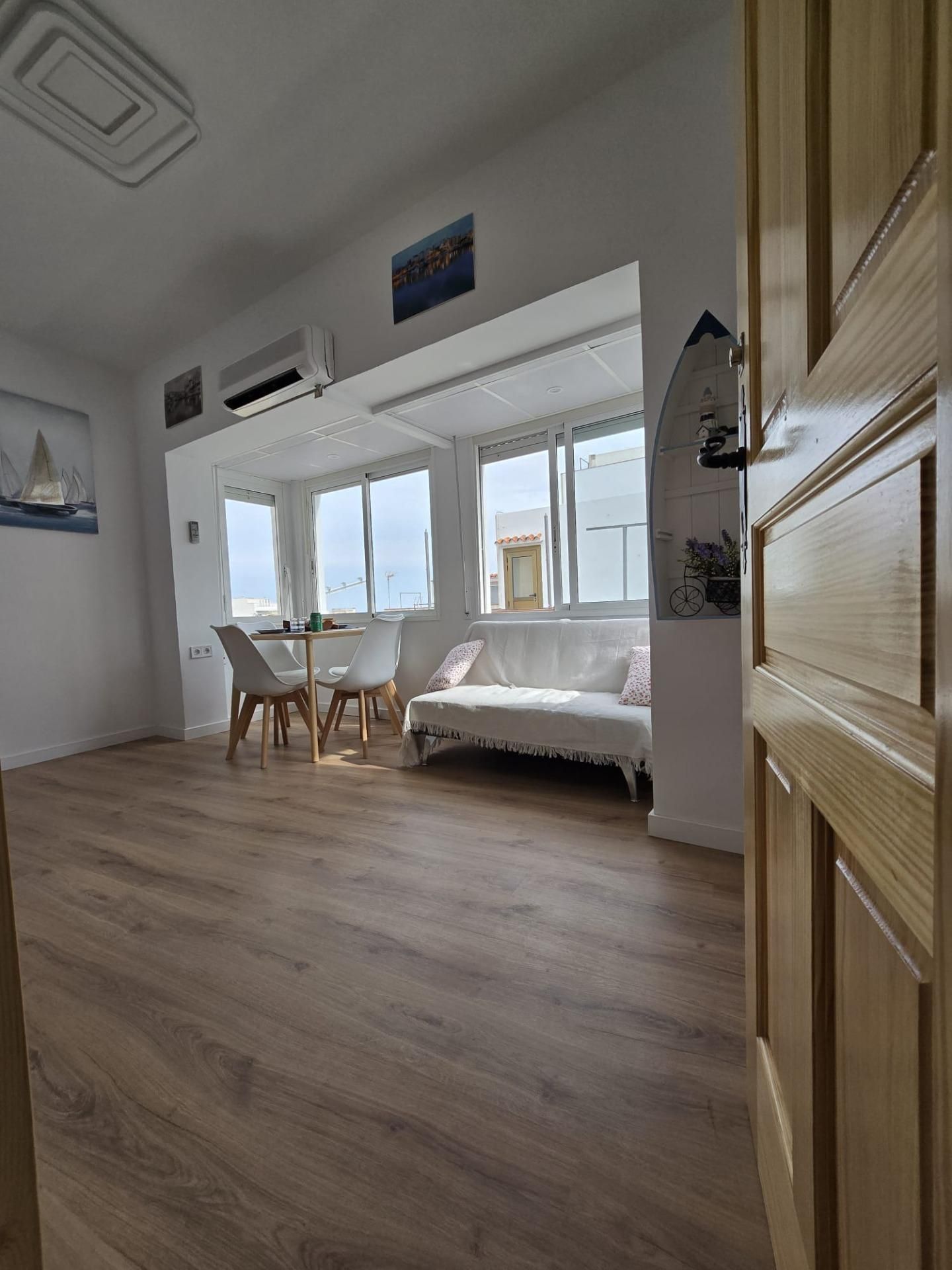 Living room of Attic for sale in L'Ametlla de Mar   with Air Conditioner, Parquet flooring and Terrace