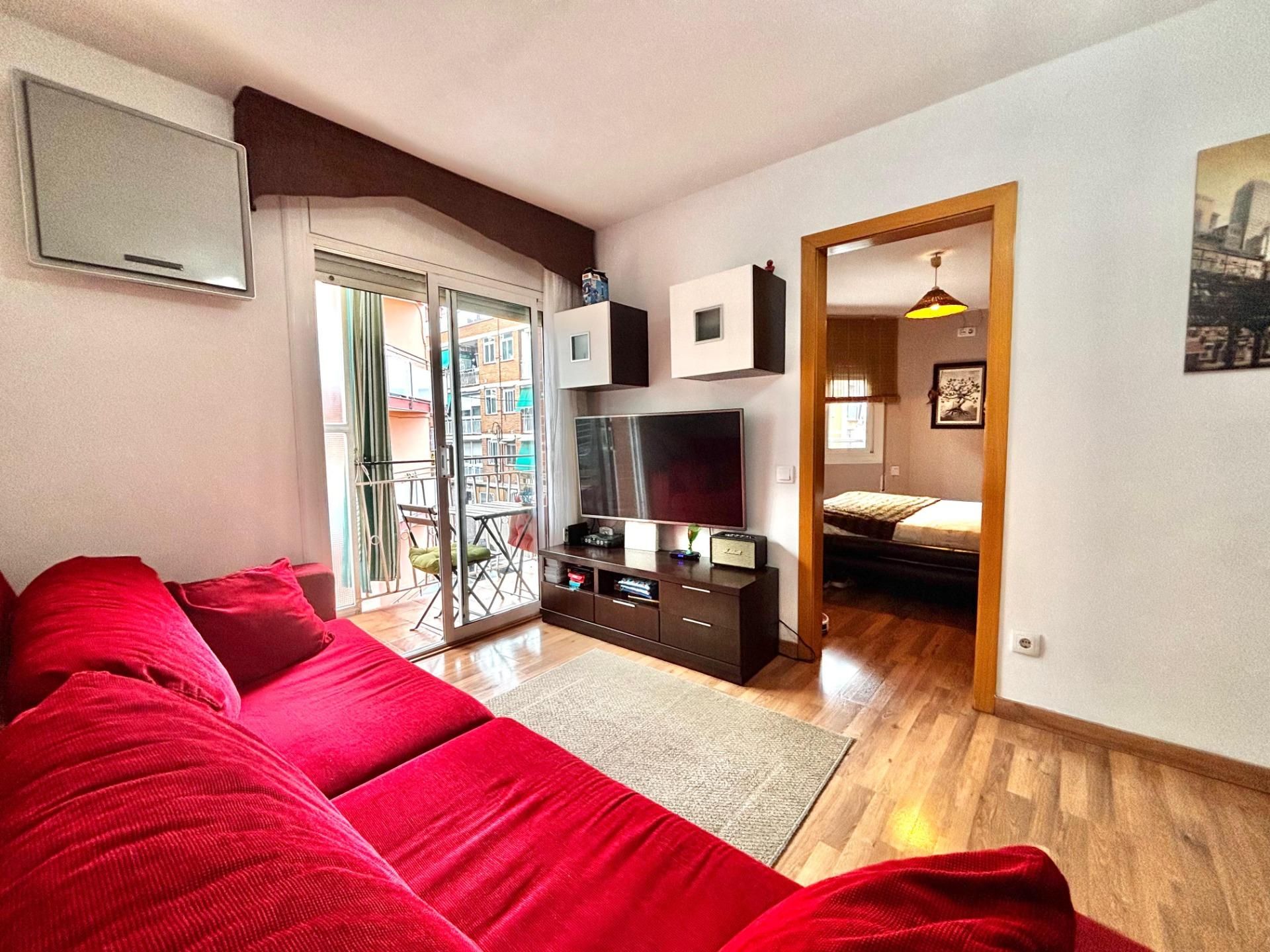 Sala d'estar de Apartament en venda en Santa Coloma de Gramenet amb Aire condicionat, Parquet i Terrassa