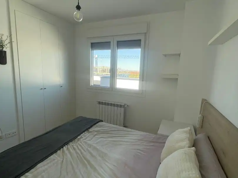 Bedroom of Attic for share in Madrid  with Air Conditioner, Heating and Parquet flooring