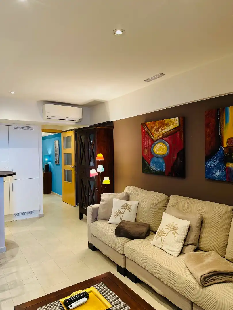 Sala de estar de Piso en venta en Palamós con Aire acondicionado, Terraza y Amueblado