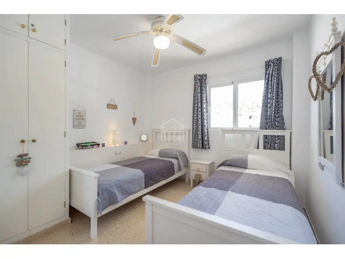 Dormitori de Apartament en venda en Es Migjorn Gran amb Terrassa i Moblat