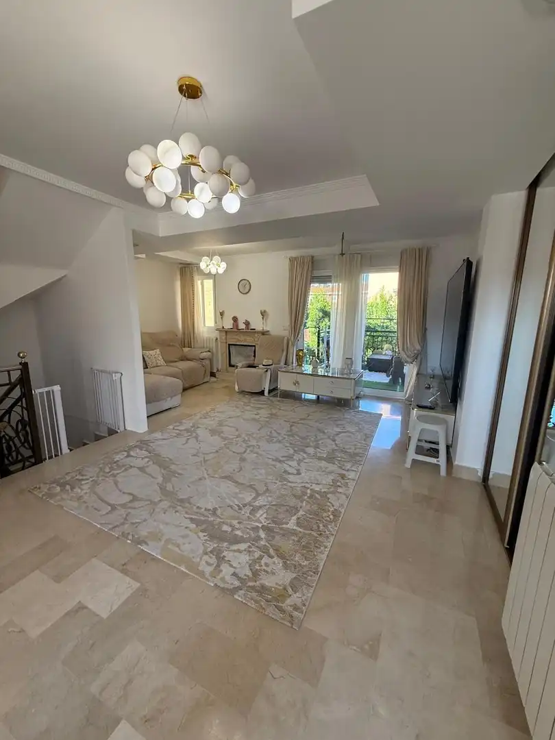 Sala d'estar de Casa adosada en venda en Sant Joan d'Alacant