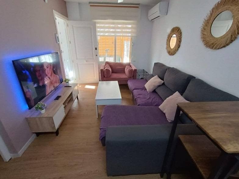 Sala d'estar de Apartament en venda en Torrevieja amb Calefacció, Jardí privat i Terrassa