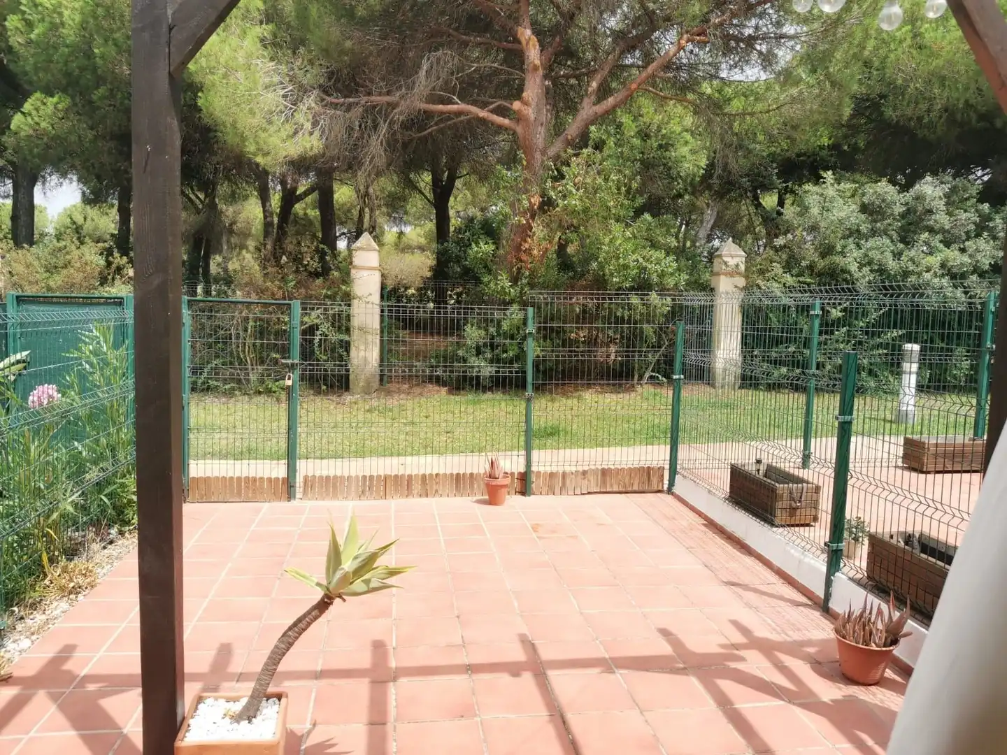Jardí de Casa adosada de lloguer en El Portil amb Aire condicionat, Terrassa i Moblat