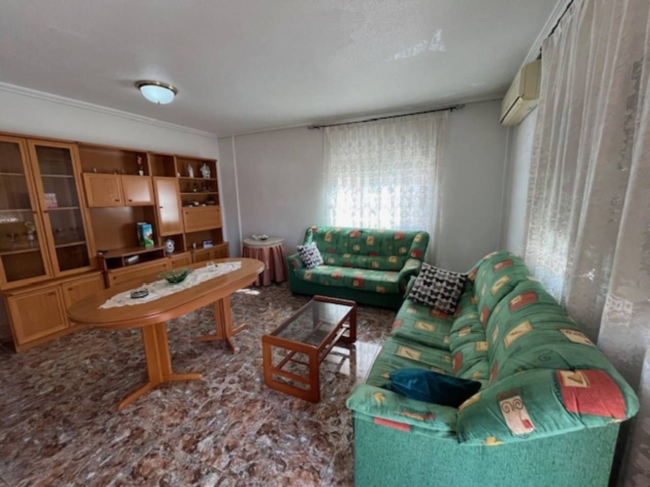 Sala d'estar de Casa o xalet en venda en Torre-Pacheco amb Aire condicionat, Jardí privat i Moblat