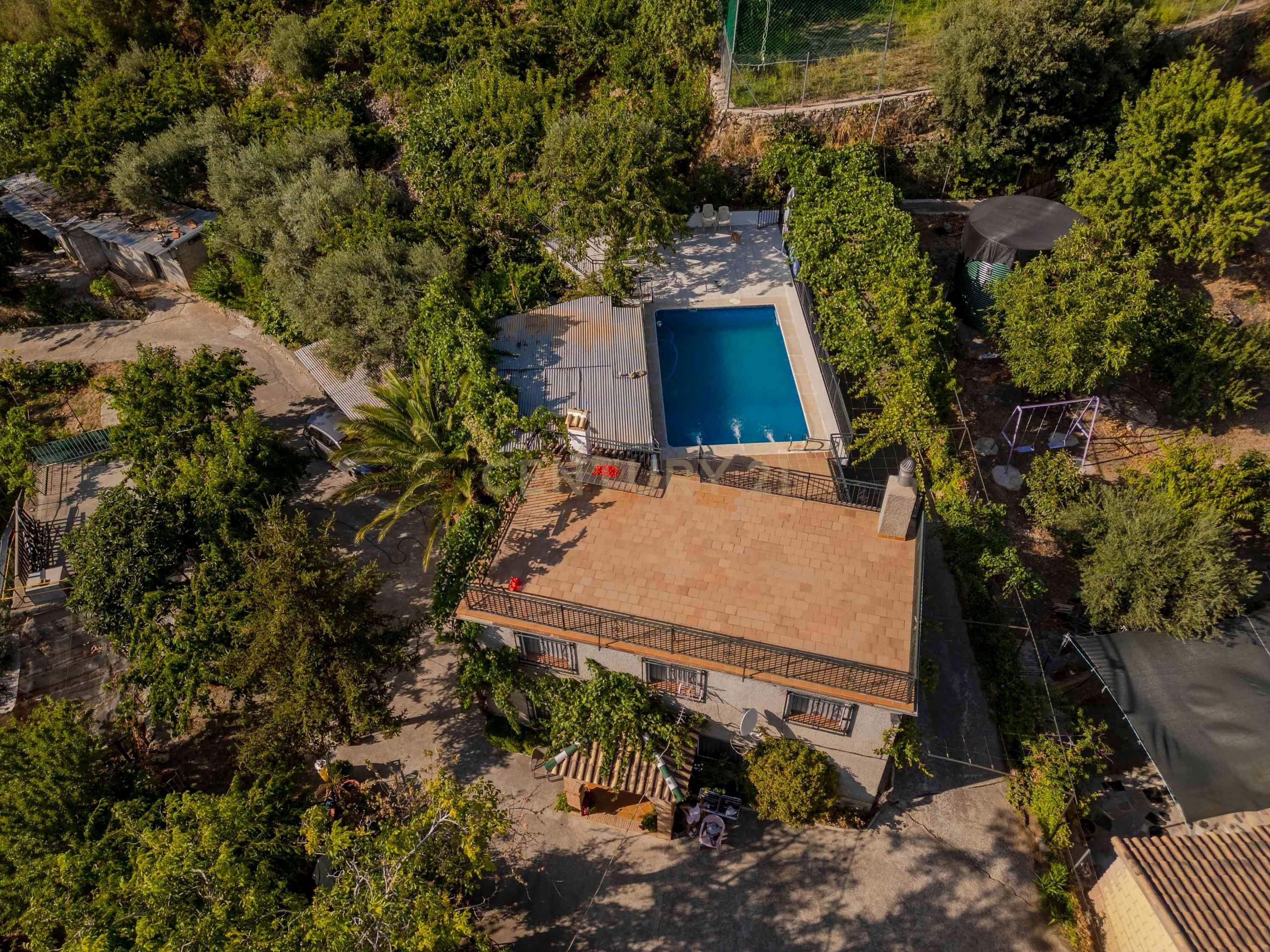 Vista exterior de Casa o xalet en venda en Güéjar Sierra amb Terrassa i Piscina