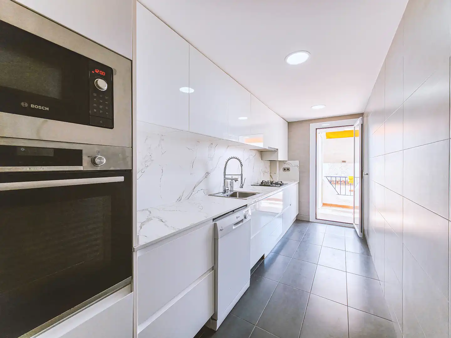 Küche von Wohnung zum Verkauf in Sant Pol de Mar mit Klimaanlage, Heizung und Parkett