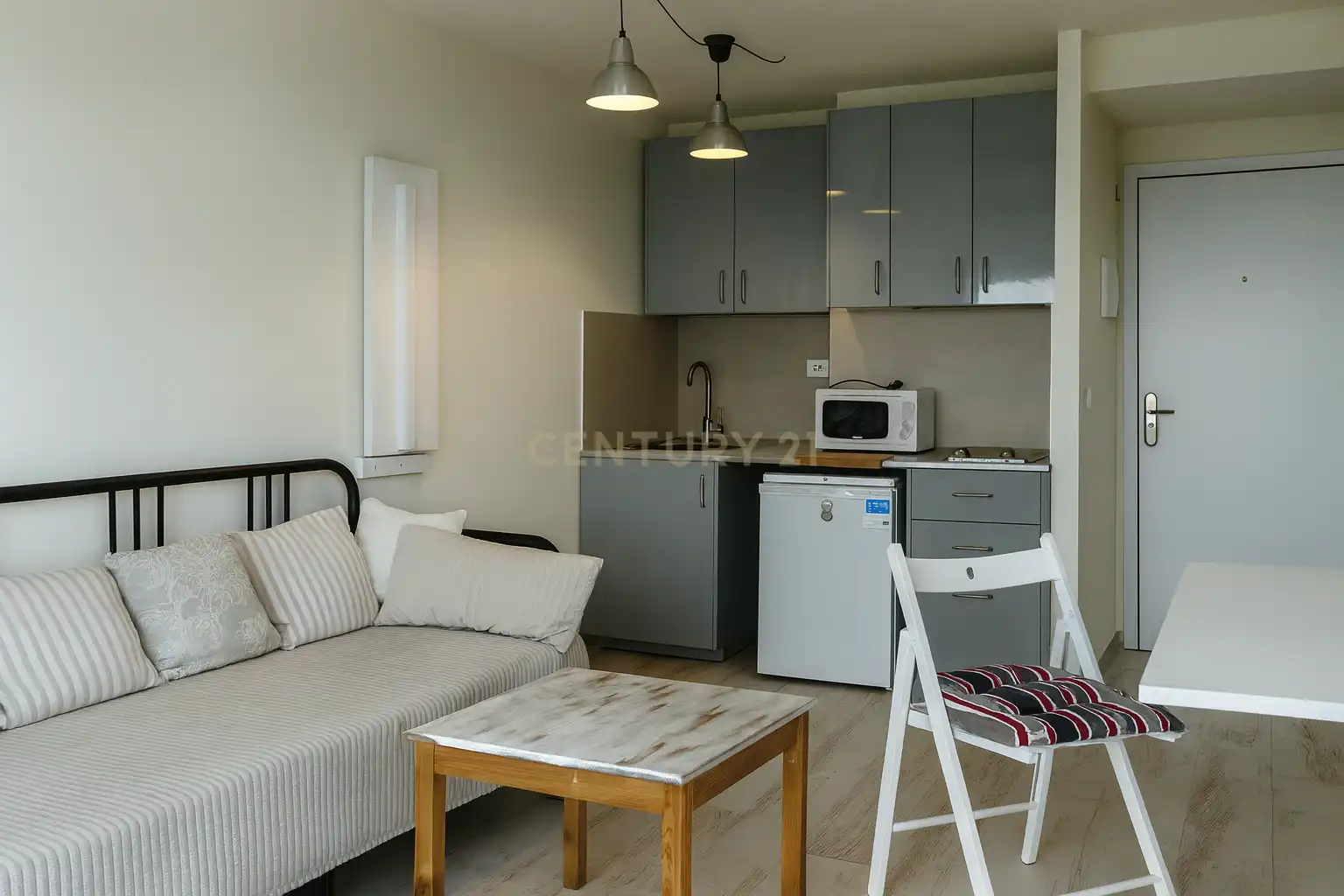 Sala de estar de Apartamento de alquiler en Calpe / Calp con Aire acondicionado, Microondas y TV
