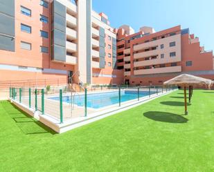 Swimming pool of Flat for sale in Roquetas de Mar  with Air Conditioner, Heating and Parquet flooring