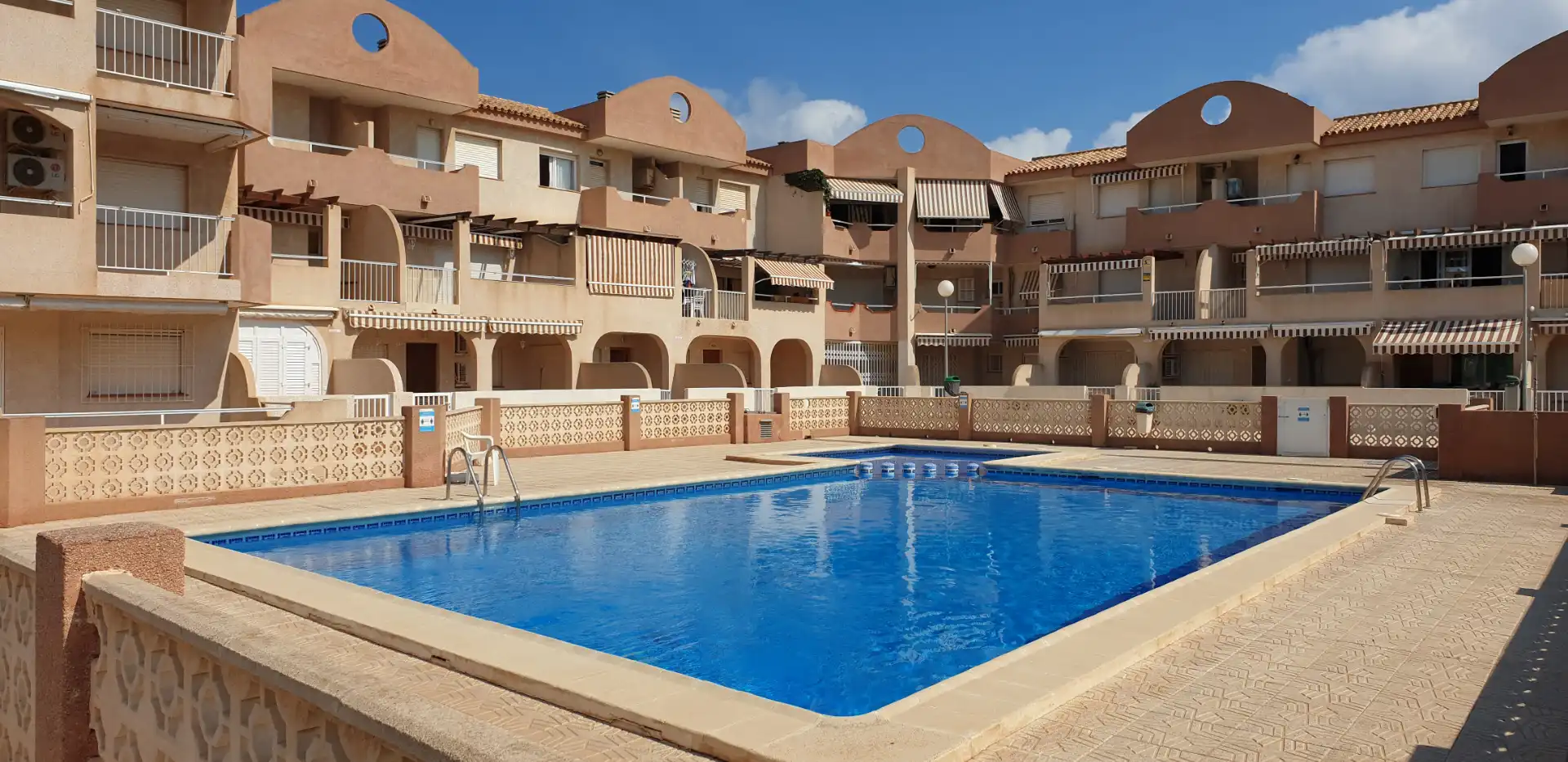 Piscina de Casa o xalet de lloguer en La Manga del Mar Menor amb Moblat i Piscina comunitària
