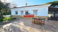 Exterior view of Country house for sale in La Puebla del Río  with Community pool